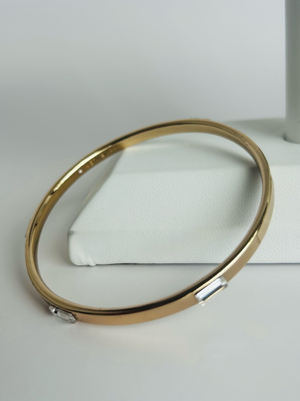 Anne Klein Gold Tone Bangle with Clear Stone Details